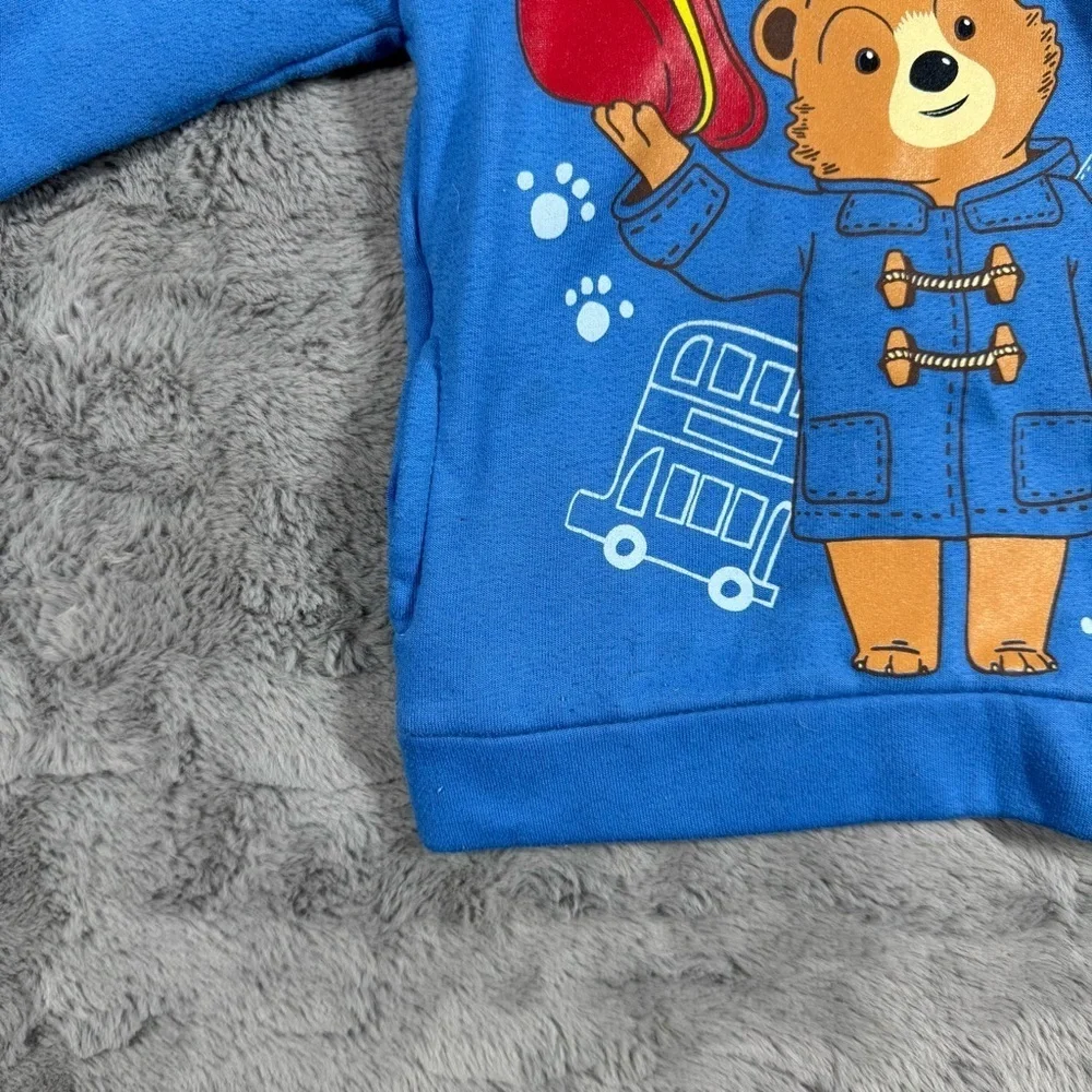Vibrant Blue Paddington Bear Hoodie with Fun Graphic Design